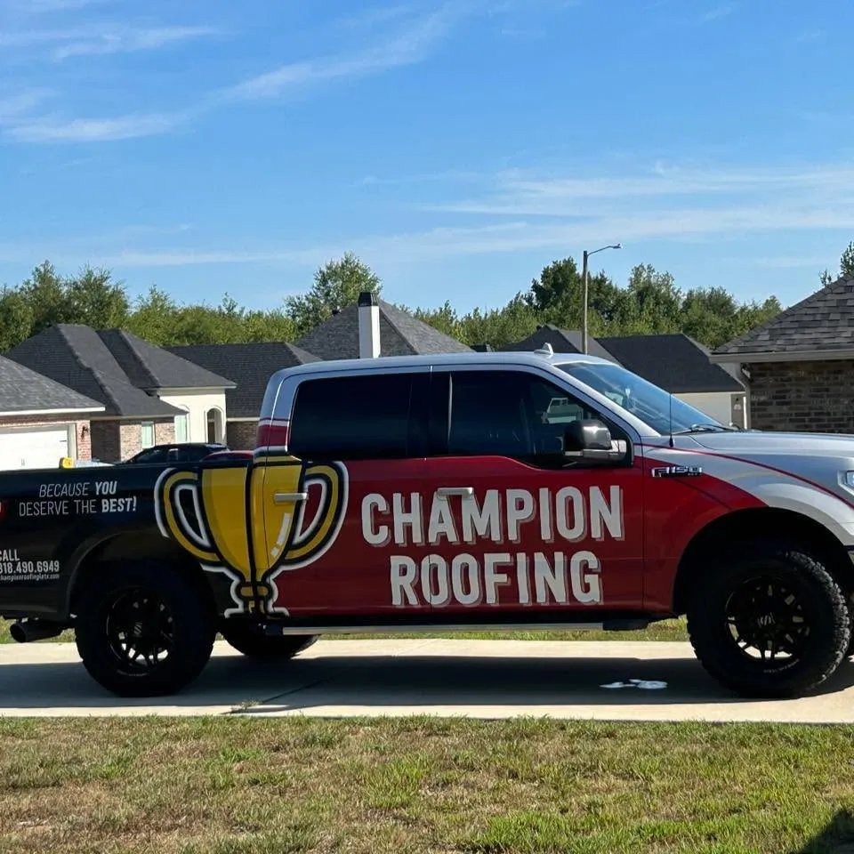 Champion Roofing branded truck parked in a Shreveport, Louisiana neighborhood